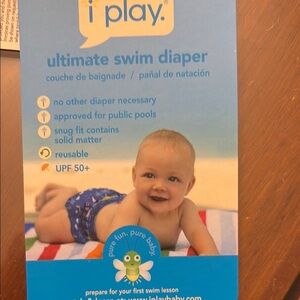 i play. Swim Diaper in Blue with Colorful Patterns